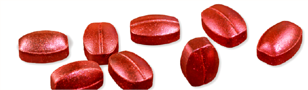 Warm Natural pearl pigment on candy and tablets — red pearlescent coated tablets